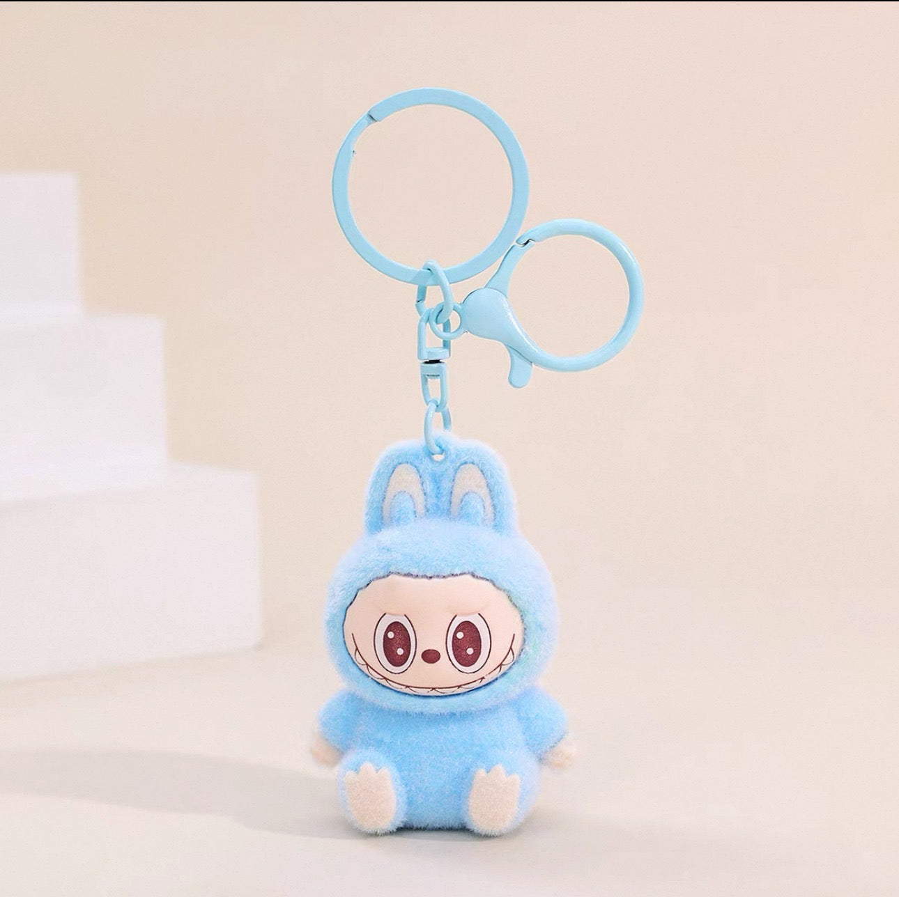 Labubu Sherling Plush Keychain – Pastel Mini Doll on Swirl Cookie Seat